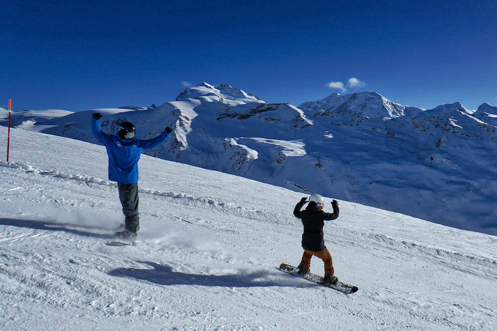 kids snowboard lessons with an instructor in Zermatt