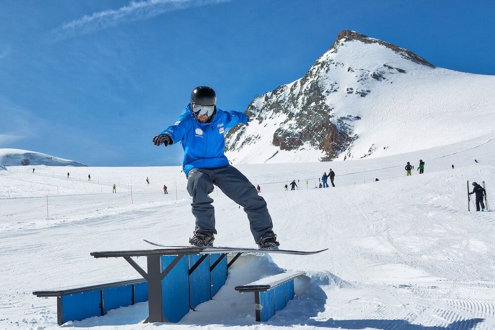 Stoked freestyle snowboard school for beginners, Swiss